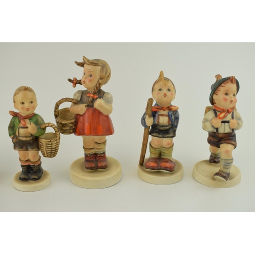 117 - A collection of Goebel Pottery figures, made in West Germany, together with a Friedel figure. (7)