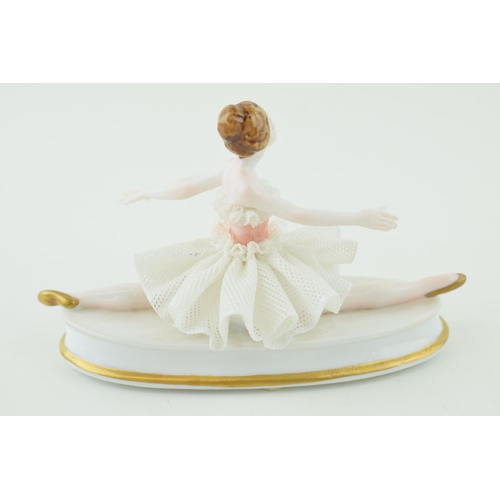 127 - Tiche Capo Di Monte lace lady figure of a ballerina, 13cm long.