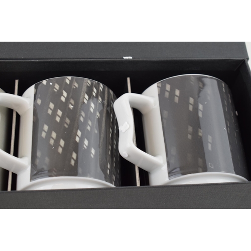 132 - Rosenthal studio-line set of 4 Mugs by Andy Warhol depicting New York, all boxed.