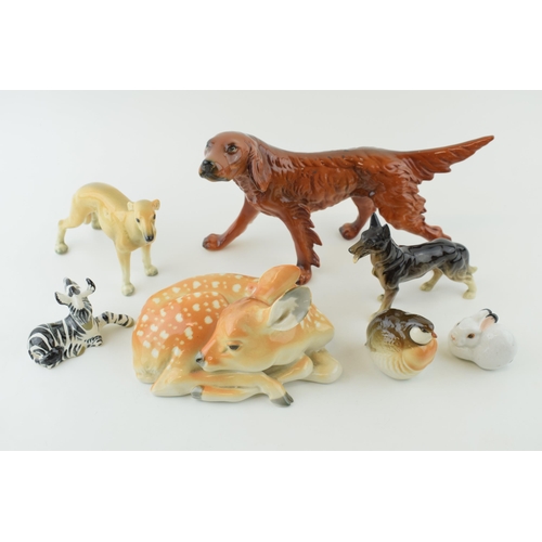 134 - Pottery animals to include a large USSR deer and others, an Italian Ronzan figure of a setter, 23cm ... 