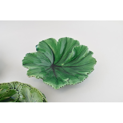 138 - A collection of 19th century green glazed cabbage wear to include Copeland set of four plates, a Cop... 