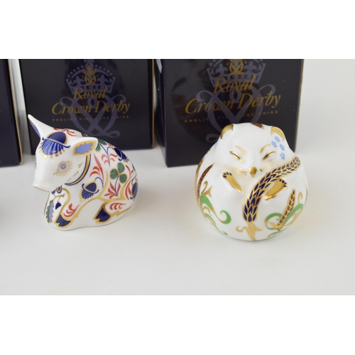 160 - Boxed Royal Crown Derby paperweights to include a Sitting Piglet, a Blue Ladybird and a Sleeping Dor... 