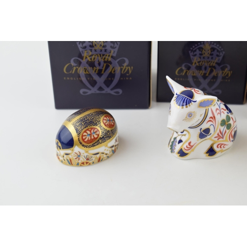 160 - Boxed Royal Crown Derby paperweights to include a Sitting Piglet, a Blue Ladybird and a Sleeping Dor... 