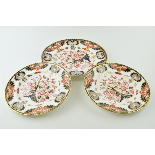 161 - A trio of Royal Crown Derby plates in the Kings pattern, 383, largest 27cm diameter (3).