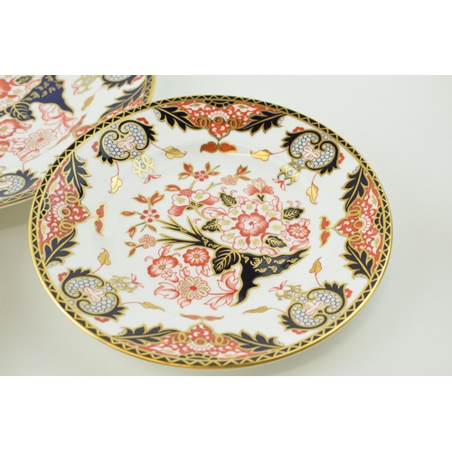 161 - A trio of Royal Crown Derby plates in the Kings pattern, 383, largest 27cm diameter (3).