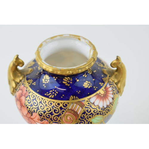 162 - Royal Crown Derby imari pottery to include a double handled trophy cup, 16cm tall, a two handled vas... 