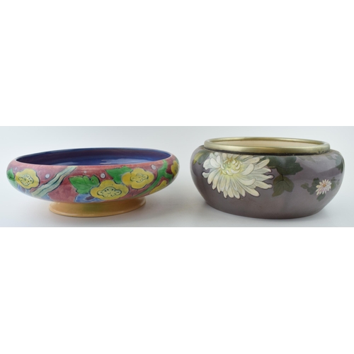 173 - A Royal Doulton Art Nouveau bowl together with another similar example with Water Lilly design and E... 