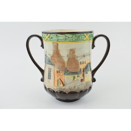 181 - Royal Doulton Potteries Past loving cup.