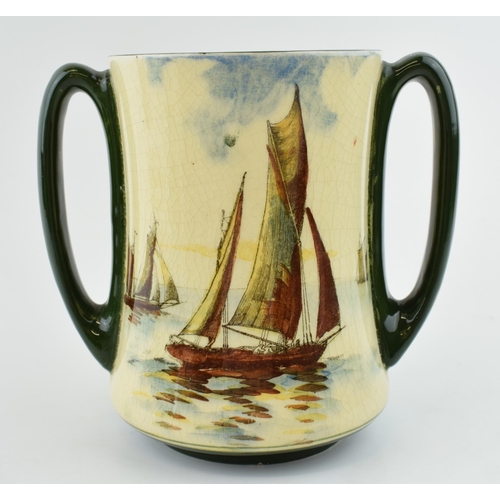 182 - Royal Doulton two handled loving cup with tall ships decoration.