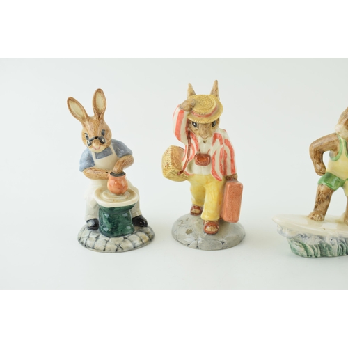 198 - Royal Doulton Bunnykins to include Bogey, Fisherman, Aussie Surfer, Father and Master Potter (5).