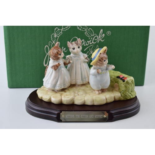 63 - Boxed Beswick Beatrix Potter figure Mittens, Tom Kitten and Moppet with wooden plinth.