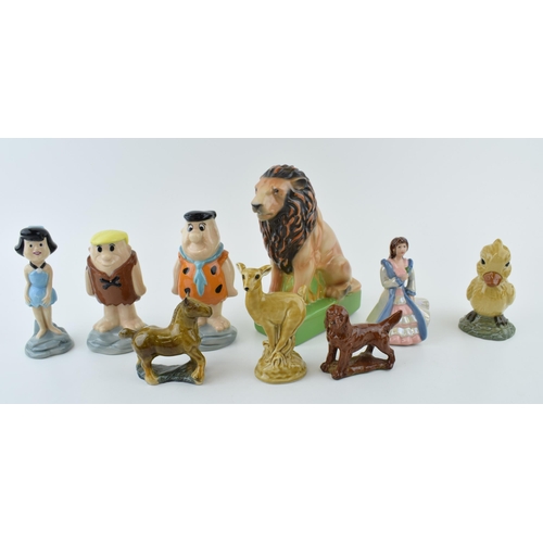 79 - 9 x Wade figures of Fred, Wilma and Barney from the Flintstones Collection, and a Duck, a Lion, a Po... 