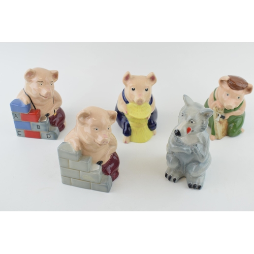 82 - Wade Three Little Pig figures to include the House of Brick x 2, the House of Straw, the House of Wo... 