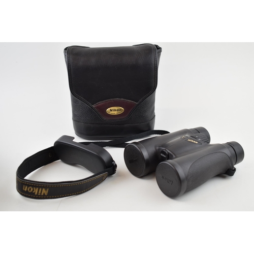 359 - Nikon 8 x 42 binoculars with case and strap.