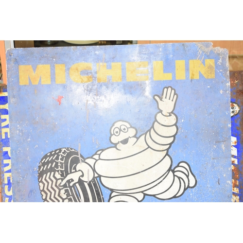 360 - A Michelin sign on aluminium depicting Bibendum Michelin Man with tyre on blue ground with yellow sc... 