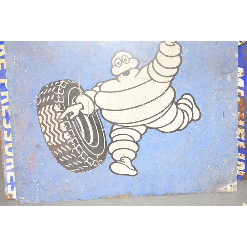 360 - A Michelin sign on aluminium depicting Bibendum Michelin Man with tyre on blue ground with yellow sc... 