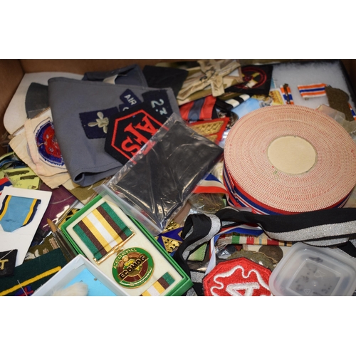 447 - A large collection of military medals, ribbons and enamel badges. To include WWII Medals, '1981 Gamb... 