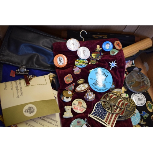 448 - A collection of enamel badges and pin badges, cap badges and belt buckles. (Qty)