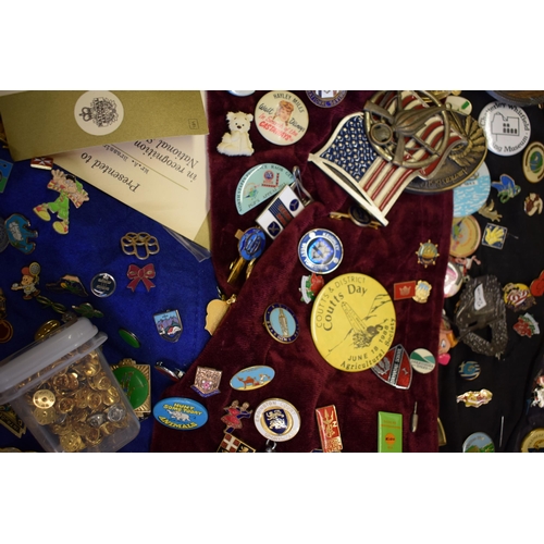 448 - A collection of enamel badges and pin badges, cap badges and belt buckles. (Qty)