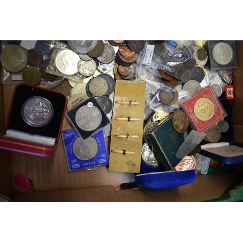 498 - A large collection of UK and foreign currency and coins to include commemorative coins, rolls of unc... 