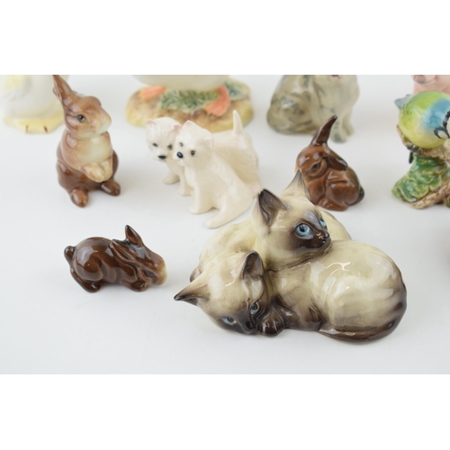 5 - A collection of Beswick to include a comical duck 160, cats, rabbits and two modern Beswick pieces t... 