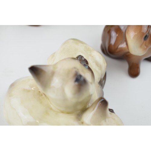 5 - A collection of Beswick to include a comical duck 160, cats, rabbits and two modern Beswick pieces t... 