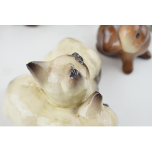 5 - A collection of Beswick to include a comical duck 160, cats, rabbits and two modern Beswick pieces t... 