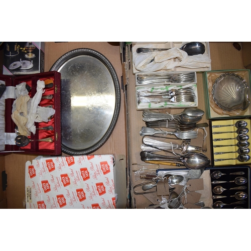 543 - A collection of silver-plated items to include cutlery, tray, scollop tray and other similar items. ... 