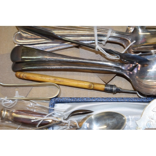 543 - A collection of silver-plated items to include cutlery, tray, scollop tray and other similar items. ... 