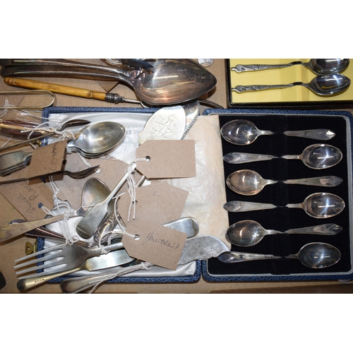 543 - A collection of silver-plated items to include cutlery, tray, scollop tray and other similar items. ... 