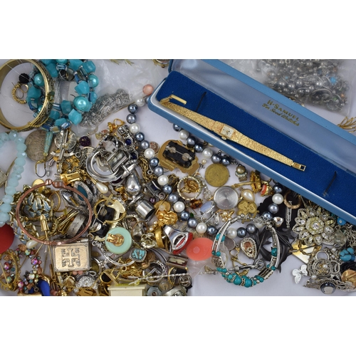 590 - Costume jewellery to include fashion watches, chains, brooches, pin badges, bangles and others (odd ... 