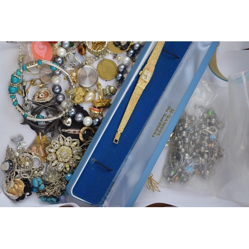 590 - Costume jewellery to include fashion watches, chains, brooches, pin badges, bangles and others (odd ... 