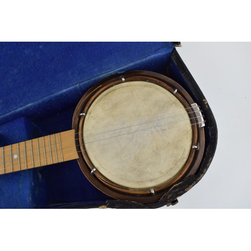 423 - Wooden ukelele / banjo with drum, in vintage leather cased. Unmarked.