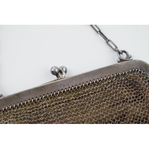 549 - Hallmarked sterling silver lady's mesh purse, velvet interior,  continental marks, gross 88.4g.