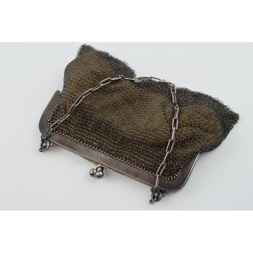 549 - Hallmarked sterling silver lady's mesh purse, velvet interior,  continental marks, gross 88.4g.