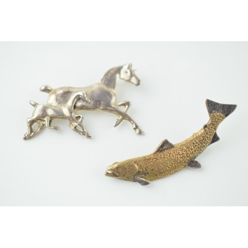 561 - A quality silver with gold appearance salmon / fish bar brooch with a similar silver brooch of a run... 