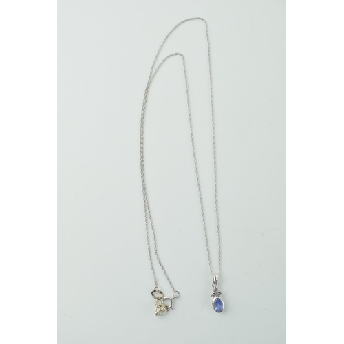 583 - 14ct white gold chain with tanzanite pendant, 1.2g.