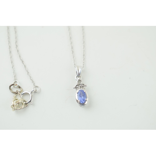 583 - 14ct white gold chain with tanzanite pendant, 1.2g.