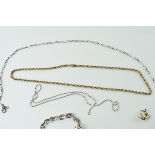 586 - Silver jewellery to include a gold plated chain, a heavy bracelet and others (Qty), 54.2g.