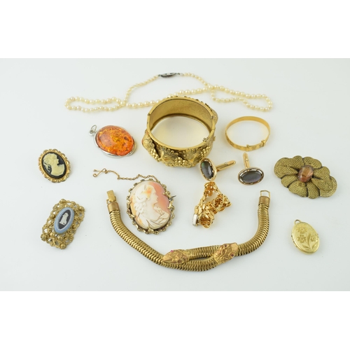 594 - Costume jewellery to include a snake articulated bracelet, a grape and vine bangle, cameos and other... 