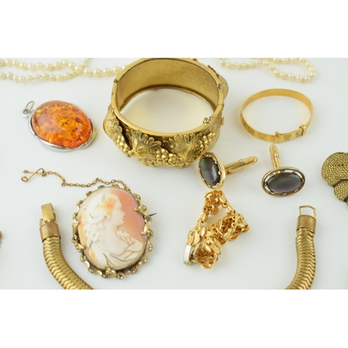 594 - Costume jewellery to include a snake articulated bracelet, a grape and vine bangle, cameos and other... 