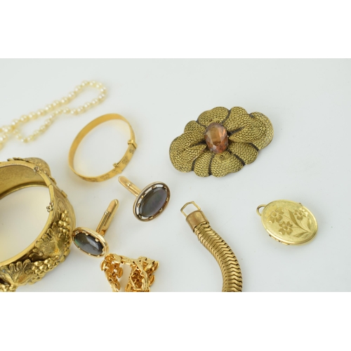 594 - Costume jewellery to include a snake articulated bracelet, a grape and vine bangle, cameos and other... 