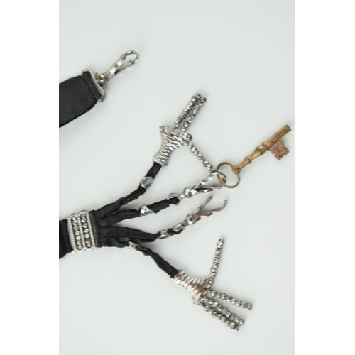 595 - Victorian cut steel chatelaine, 25cm long.