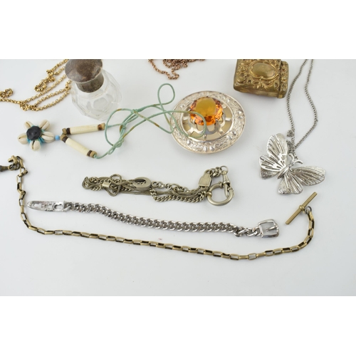 600 - Jewellery to include a silver topped glass jar, a gold plated longuard chain, a brass vesta case, a ... 