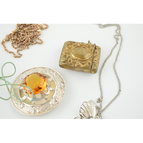 600 - Jewellery to include a silver topped glass jar, a gold plated longuard chain, a brass vesta case, a ... 