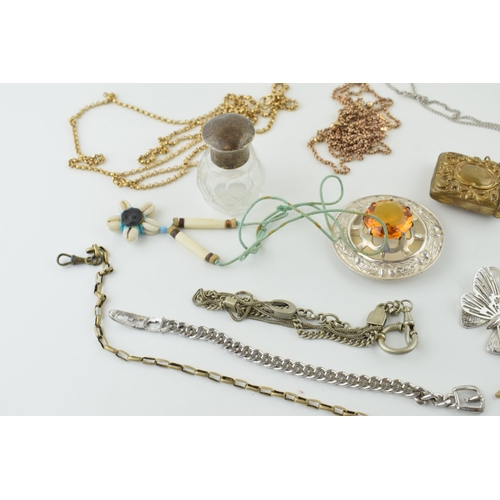 600 - Jewellery to include a silver topped glass jar, a gold plated longuard chain, a brass vesta case, a ... 