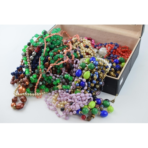 601 - A jewellery box of various beaded necklaces of varying styles, ages and lengths (Qty).