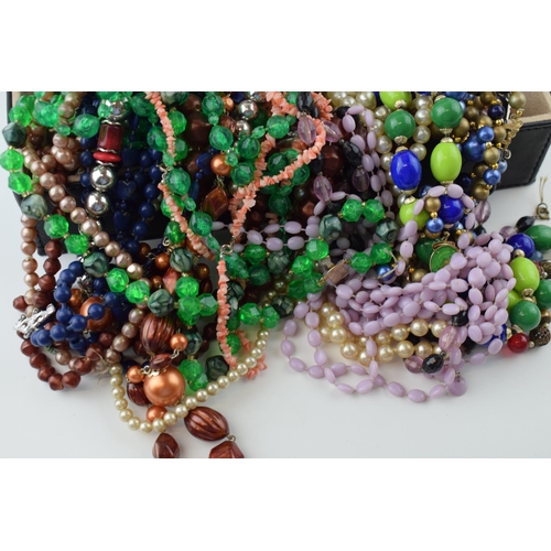 601 - A jewellery box of various beaded necklaces of varying styles, ages and lengths (Qty).