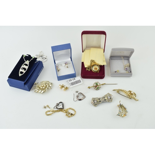 607 - A collection of silver and costume jewellery to include gold on silver bracelet, silver heart earrin... 