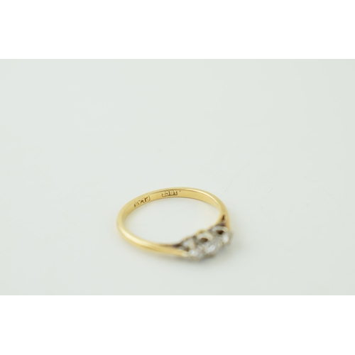 617 - 18ct yellow gold ring, with triple set diamond in platinum mount. Weight 2.0grams.